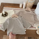 【73-100】 サイドボタン ボーダー シャツ - 画像 (10)