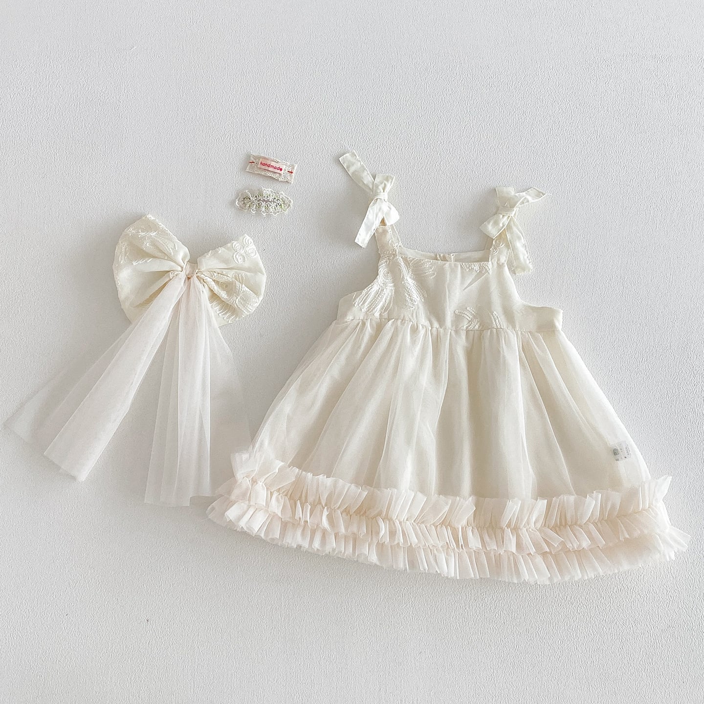 4e80ed753d27a3ffd921ed229e66d16f.jpg 【73-100】ワンピース 蝶結び付き シンプル 女の子 おしゃれ - 画像 (1)