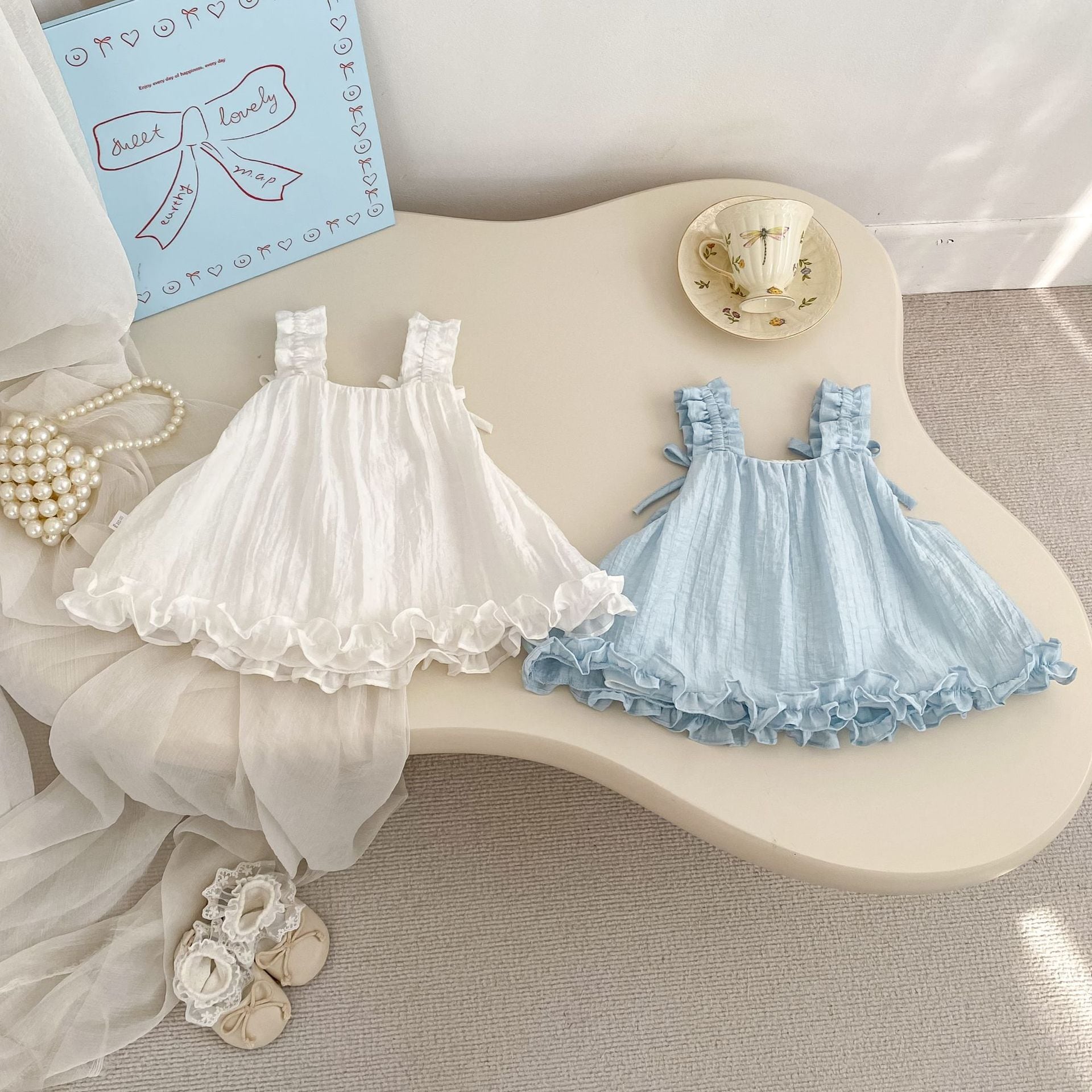 d741975dd79e8c21fae1c1e0b7608121.jpg 【73-120】キャミソール 蝶結び 無地 おしゃれ 女の子 - 画像 (1)