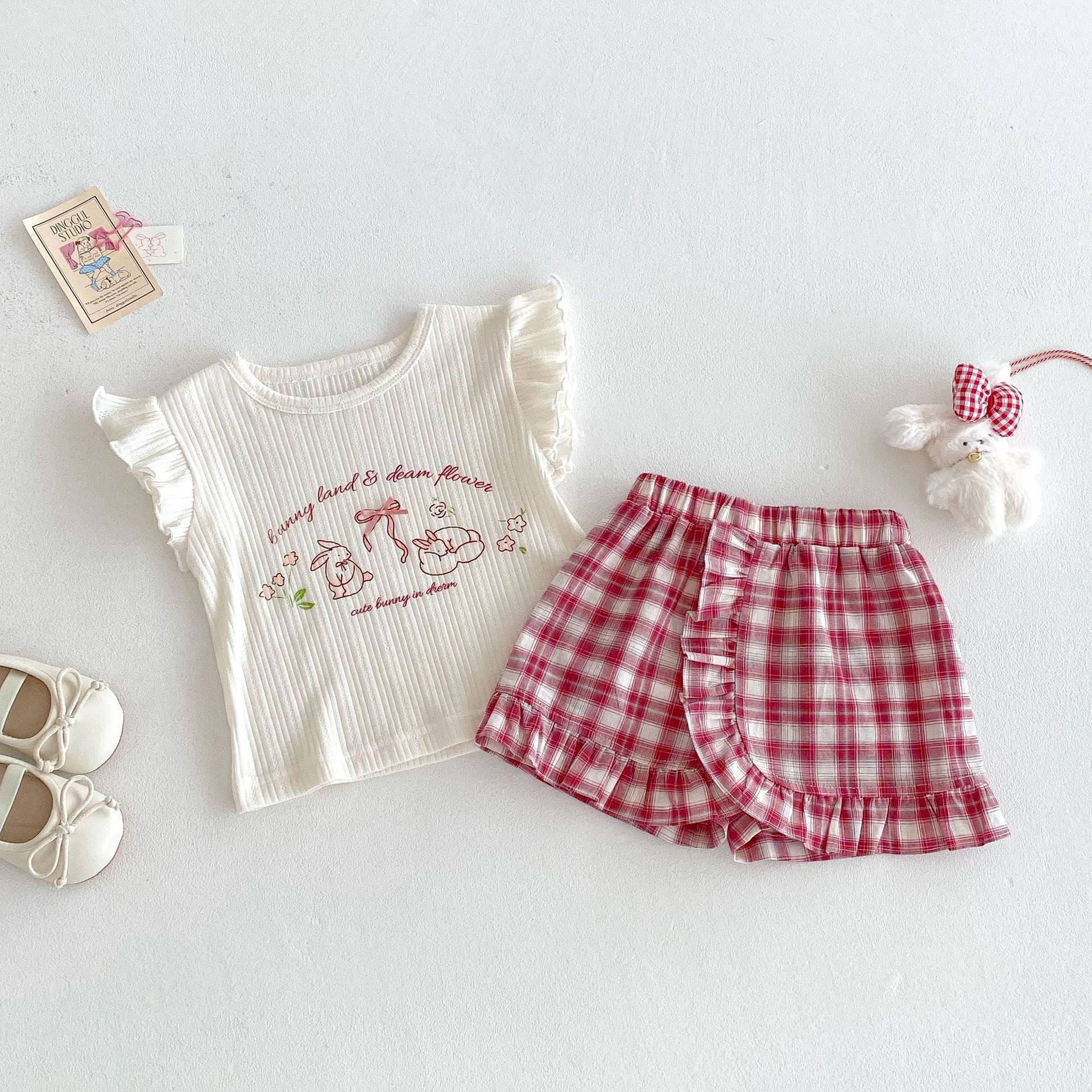 ebc47c37fecaf7020a9e84cef37692a9.jpg 【73-120】トップスorパンツ ウサギ ロゴフリル おしゃれ - 画像 (1)