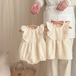 【66-100】ロンパースorワンピース フリル クリーム 姉妹服